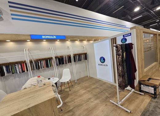Borealis booth interior with sample garments
